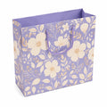 Sacchetto regalo 32 x 12 x 26 cm in carta lilla con manici in corda e motivo floreale