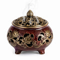 Bruciatore d'incenso rotondo Ø 18 cm in ceramica rosso scuro con coperchio traforato stile classico