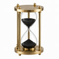 Clessidra decorativa Ø 20 cm H 38 cm in vetro e metallo dorato con sabbia nera